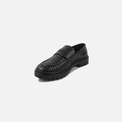 Black textured loafer shoe on a white background