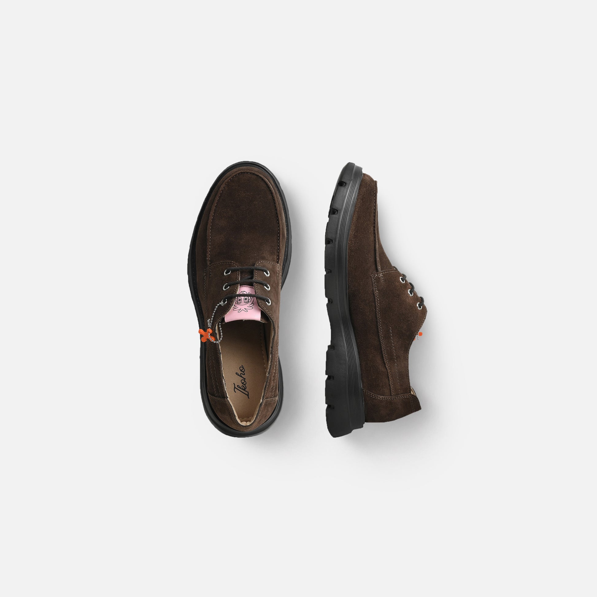 A pair of dark brown suede lace-up shoes shown from top and side views on a light gray background.