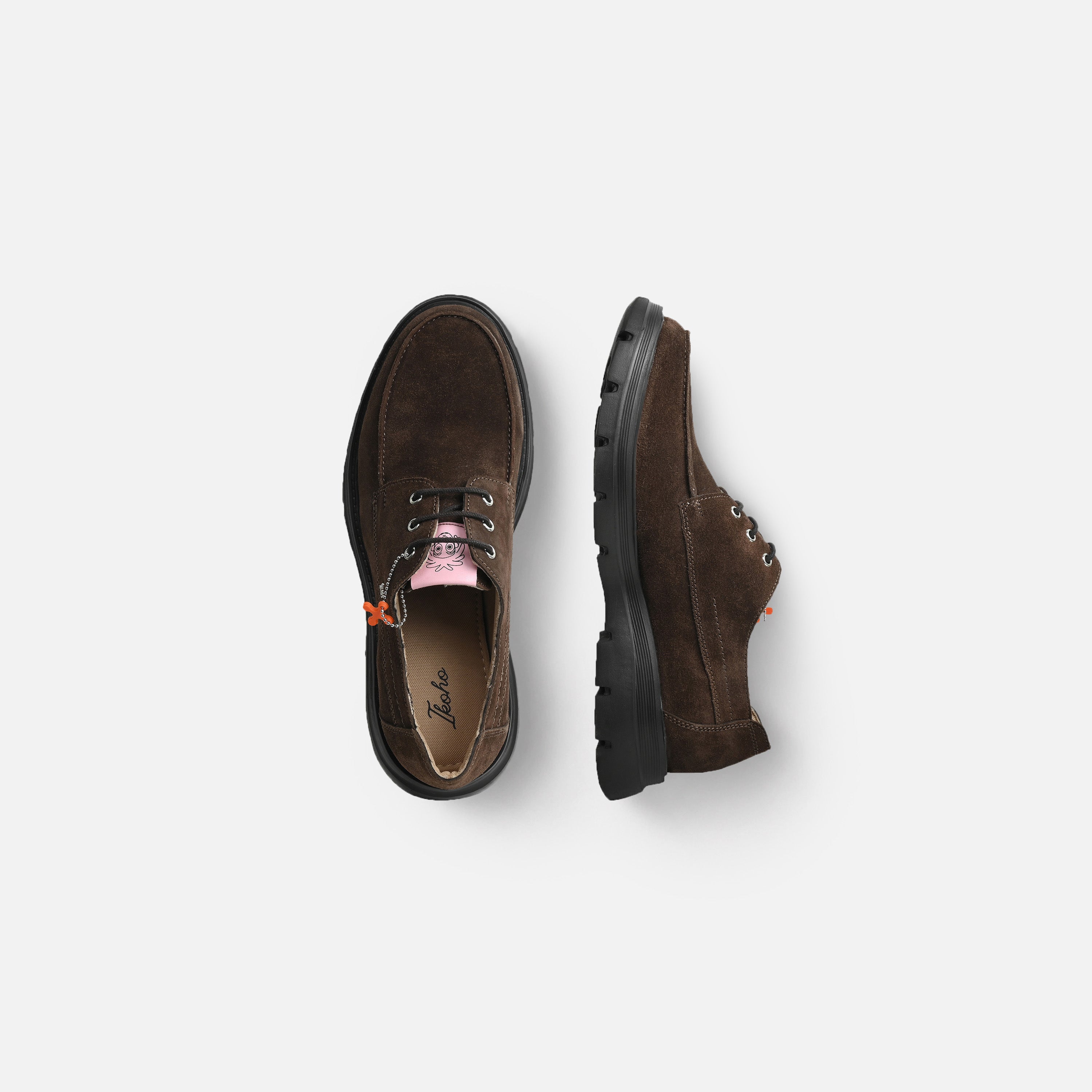 A pair of dark brown suede lace-up shoes shown from top and side views on a light gray background.