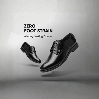 Black dress shoes on a gray background with 'Zero Foot Strain' text.