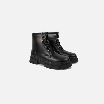 Black leather boot on a white background 