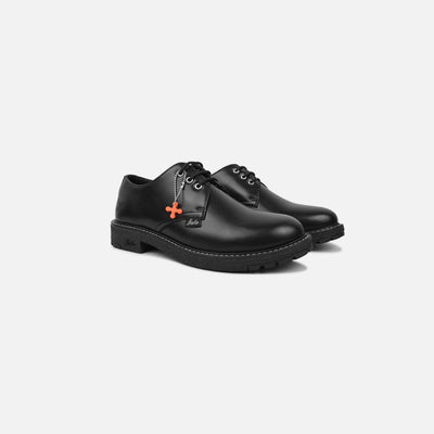 Black leather shoes with a brand logo on a white background